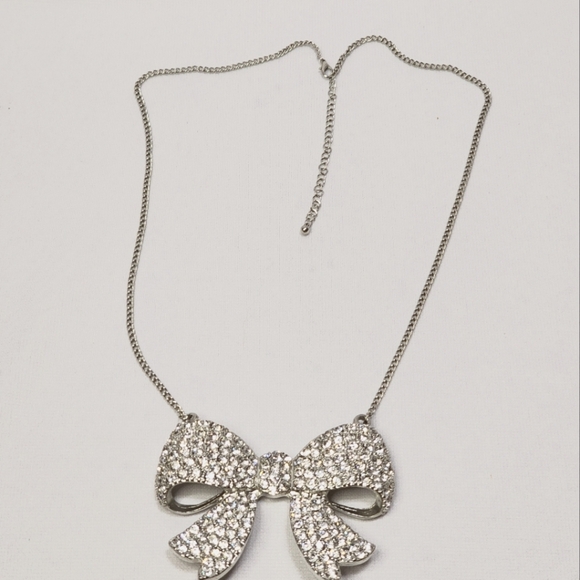 Fashion Forward Large Rhinestone and Silver Bow Pendant Necklace - Picture 3 of 11